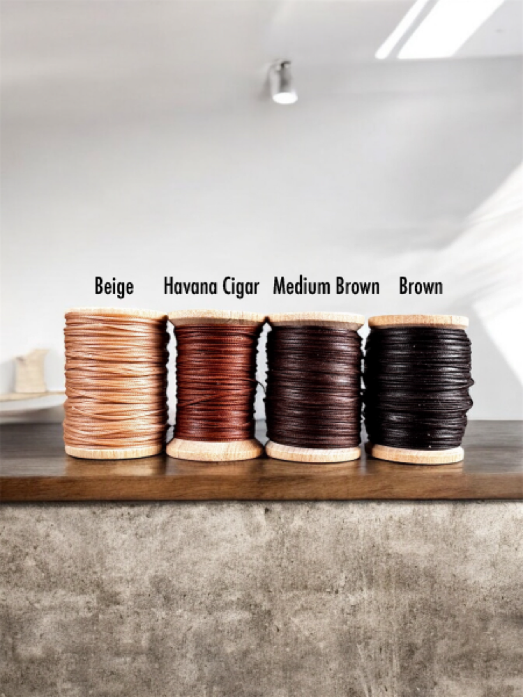 Four spools of waxed thread: beige, havana cigar, medium brown, and brown