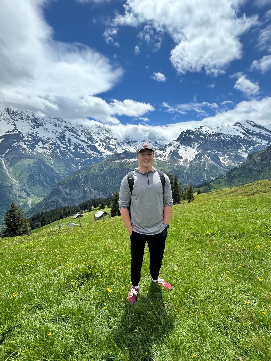 Marcus outdoors in the mountains